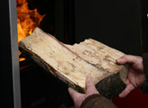 Log about to be put in burner