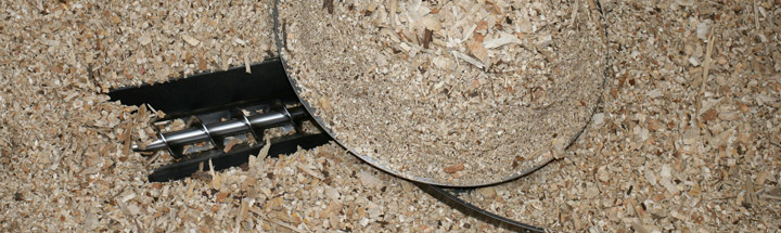 Auger feeding wood chip